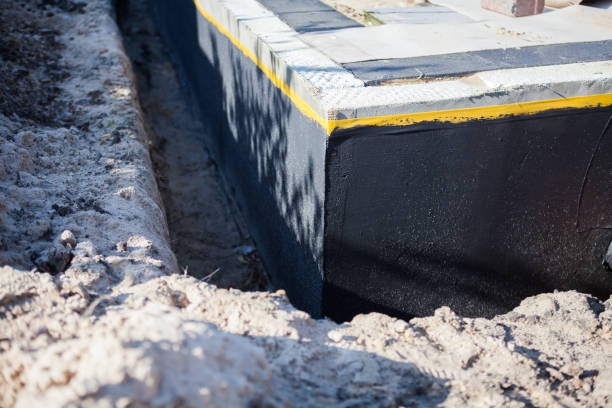 Professional Waterproofing technician working in Langhorne, PA